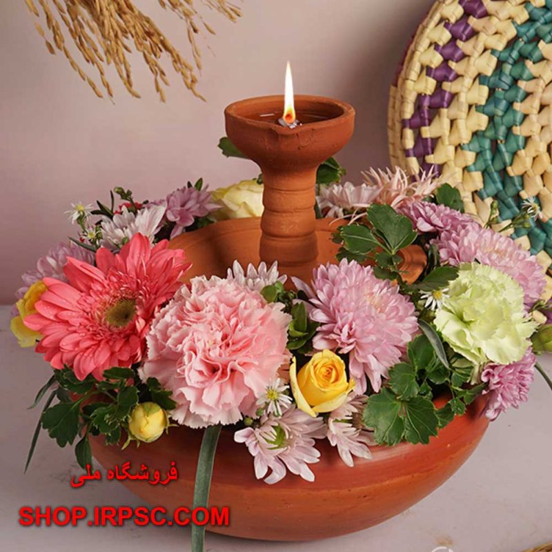 تزیین گلدان سفالی با گل مصنوعی