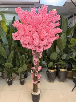 شکوفه بهاری مصنوعی صورتی با تنه چوب طبیعی و برگ پارچه‌ای قابل شستشو